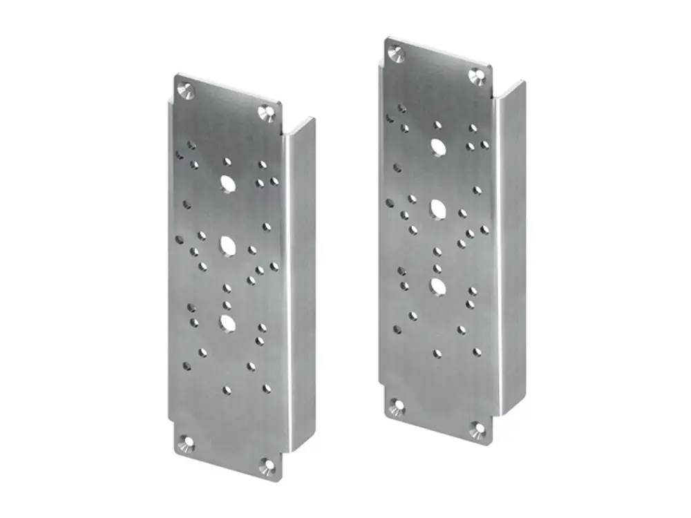 Zwei vertikale, metallische Platten mit mehreren Löchern und Ausschnitten, geeignet für die Montage von Stützklappgriffen, gefertigt von TECE.